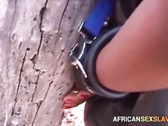 Ebony BDSM Sex Slaves Tied Up In Forest
